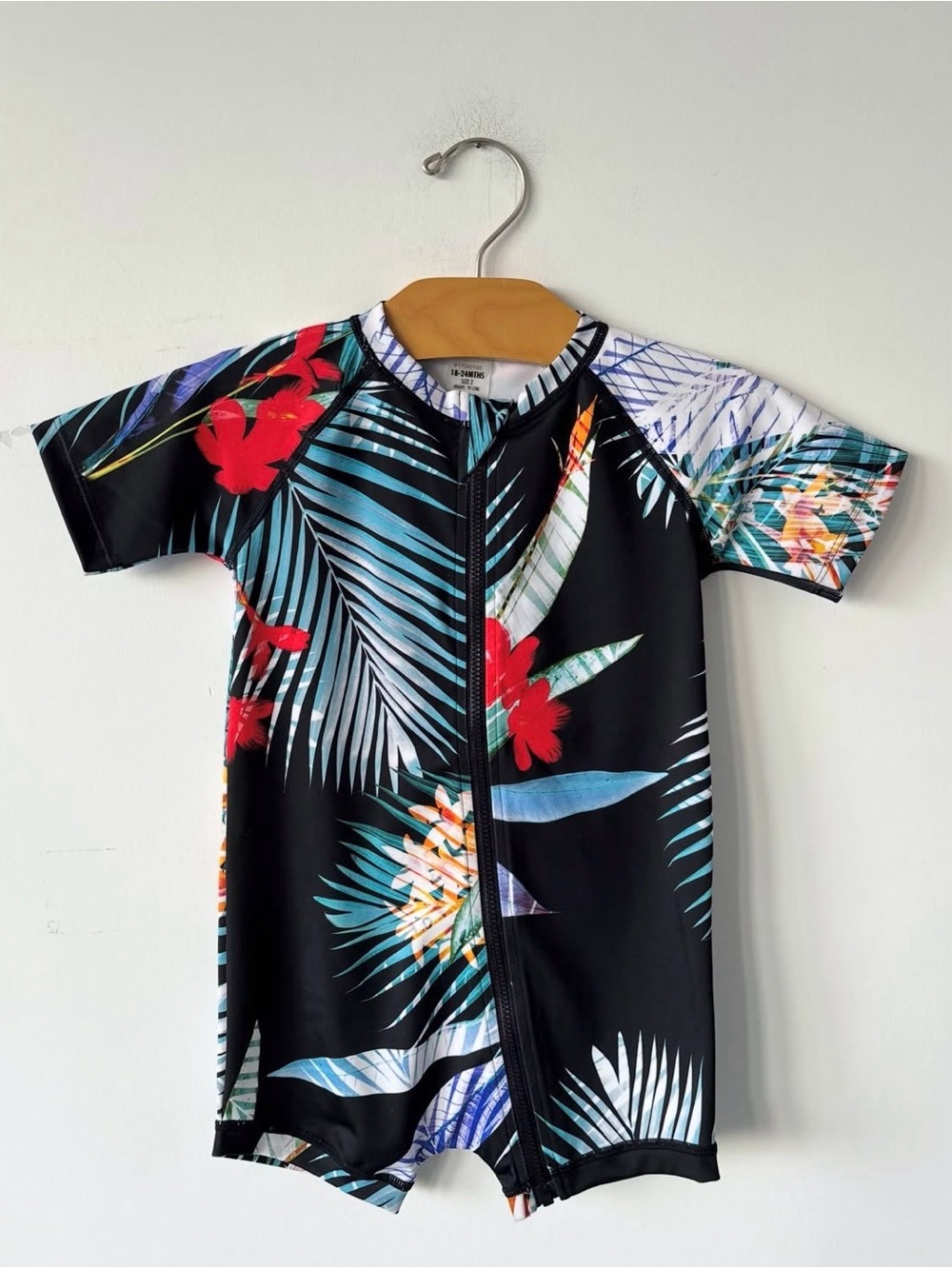 Bonds Black Tropical Short-Sleeve Zip Swim Suit with Red & Teal Print